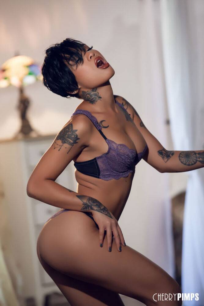 Super hot ebony Honey Gold bares her tattooed body and toys with a glass dildo - #2