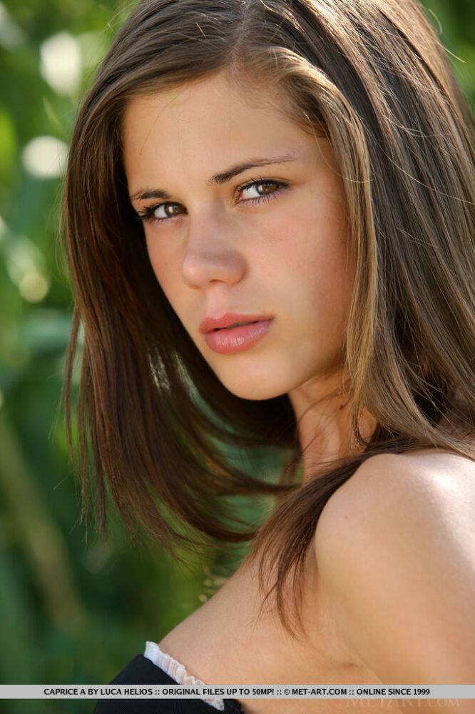 Young beauty Caprice A gets completely naked while in a cornfield - #7