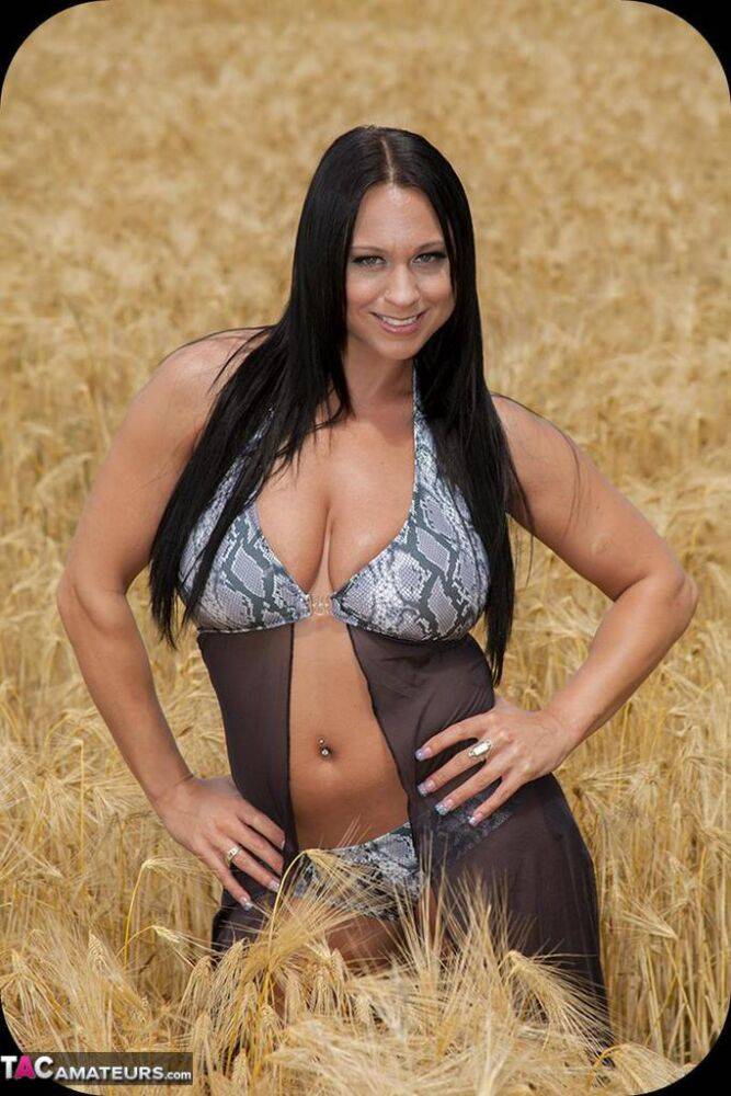 Big boobed brunette Isis gets totally naked in a field of wheat - #15