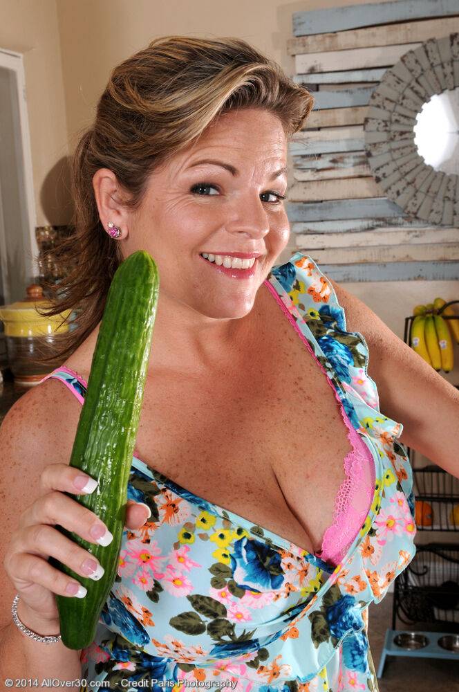 Busty older mom Marie Michaels in the kitchen toying with a big cucumber naked - #4