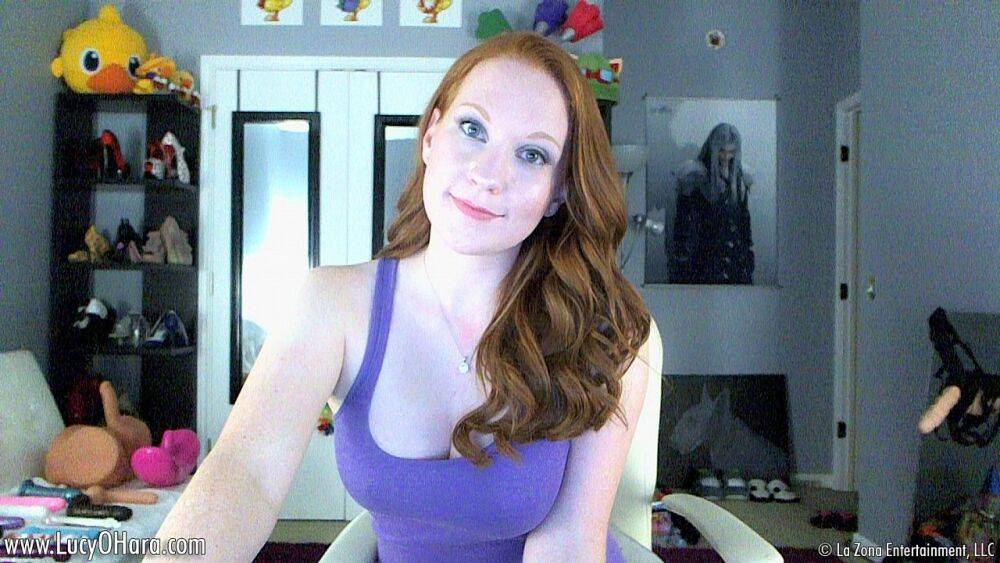 Pale redhead Lucy OHara gets naked on webcam and lays with a bright yellow toy - #7