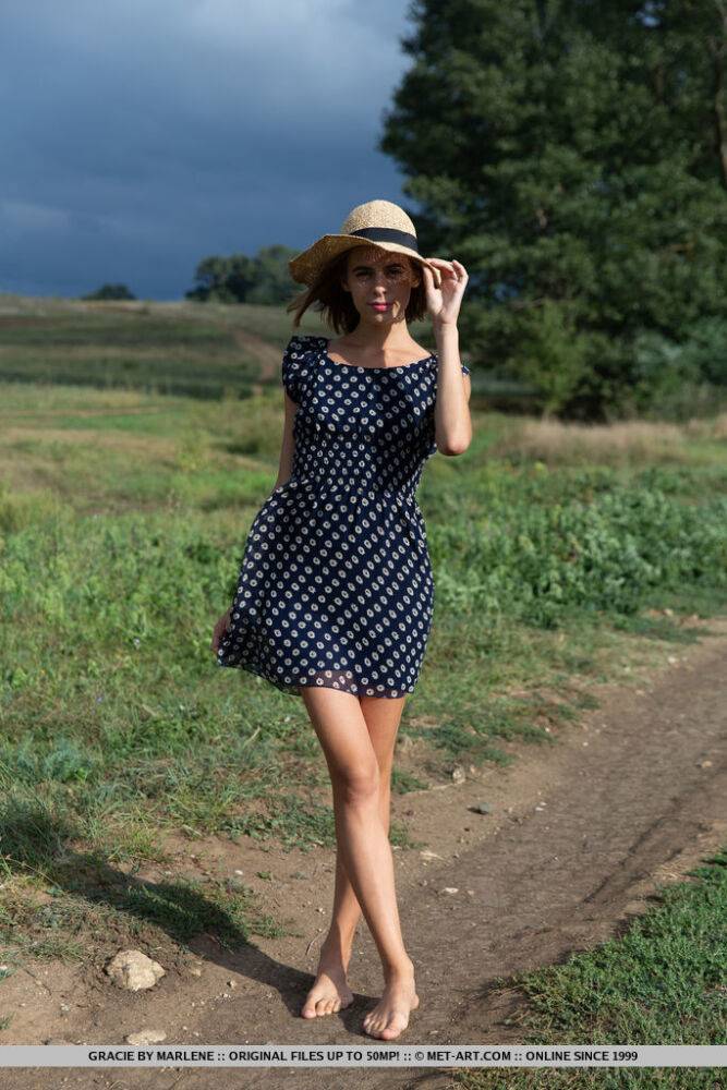 Skinny teen Gracie removes polka-dot dress to model naked in a field - #10