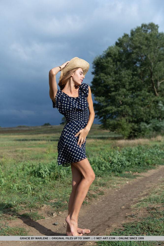 Skinny teen Gracie removes polka-dot dress to model naked in a field - #15