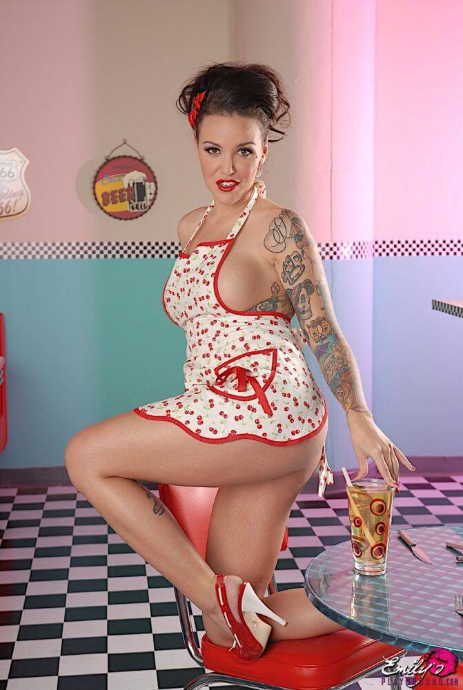 Tattooed waitress Emily Parker doffs an apron to pose totally nude in a diner - #7