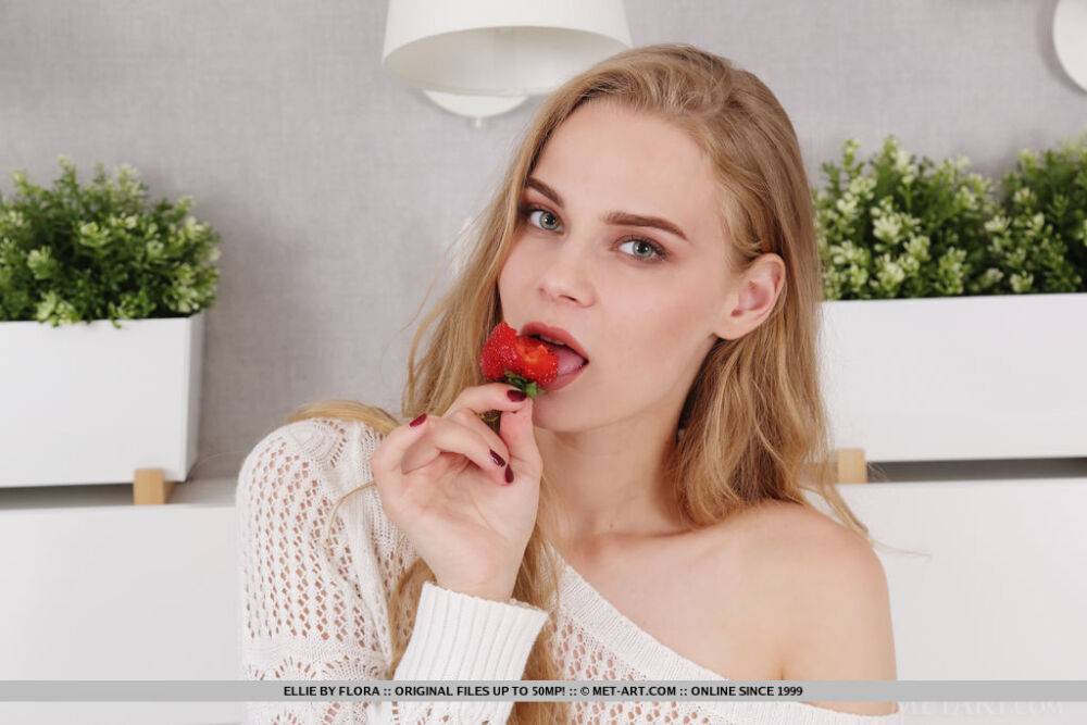 Fair skinned teen Ellie eats a bowl of berries before a nude modelling gig - #4