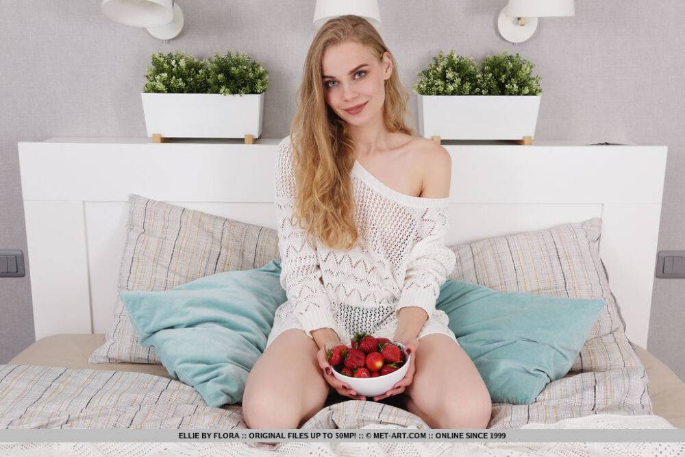 Fair skinned teen Ellie eats a bowl of berries before a nude modelling gig - #2