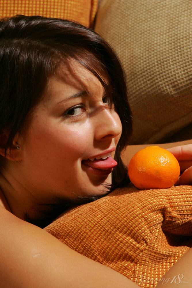 Barely legal brunette Alisia gets completely naked over a bunch of clementines - #6