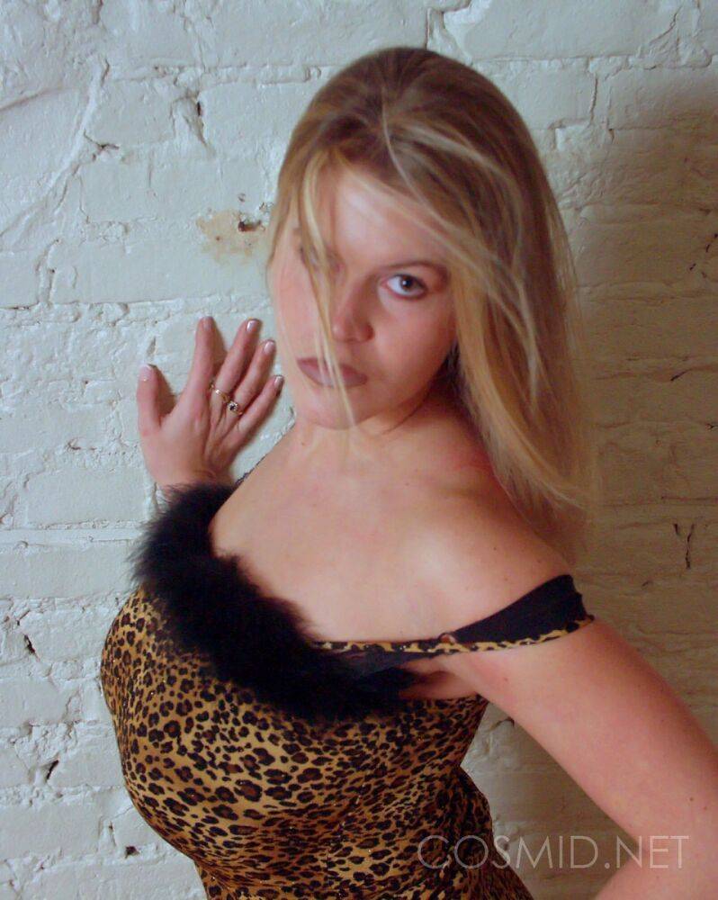 Amateur chick frees a big breast and tight ass cheeks from leopard print dress - #6