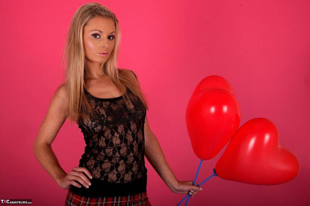 Blonde amateur displays her small tits amid a whole bunch of balloons - #15