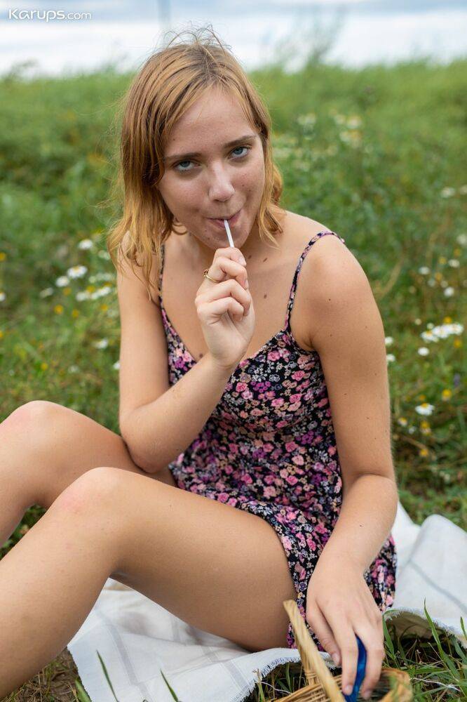 First timer Oxana Chic toys her pussy in a field while wearing sandals - #2