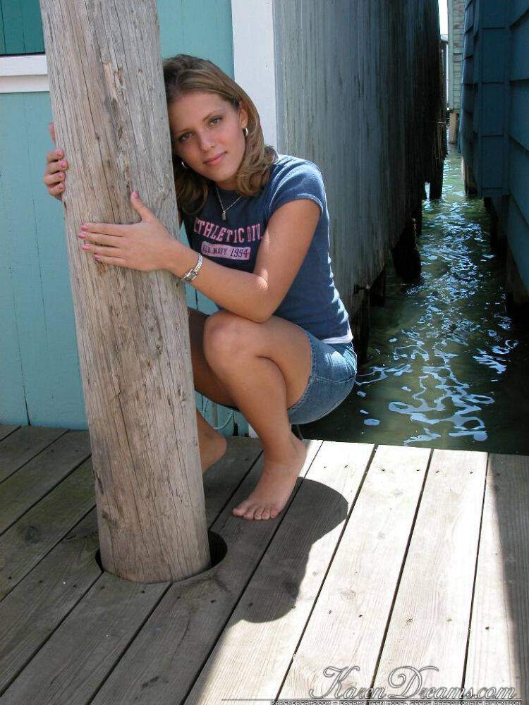 Cute young Karen squats on the pier to flash a hot cotton panty upskirt - #11