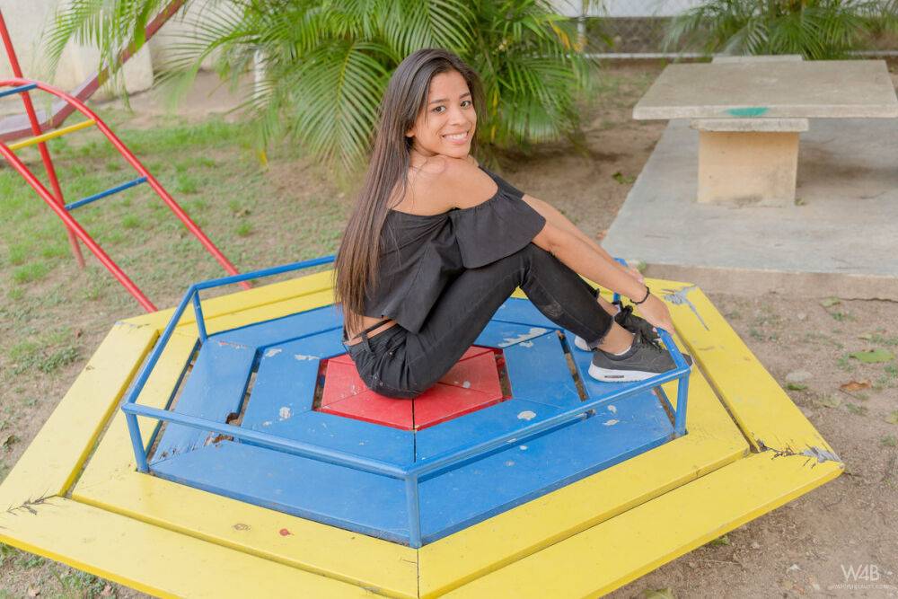 Smiley hot glamour girl Karin Torres looking sexy in ripped jeans on a swing - #6