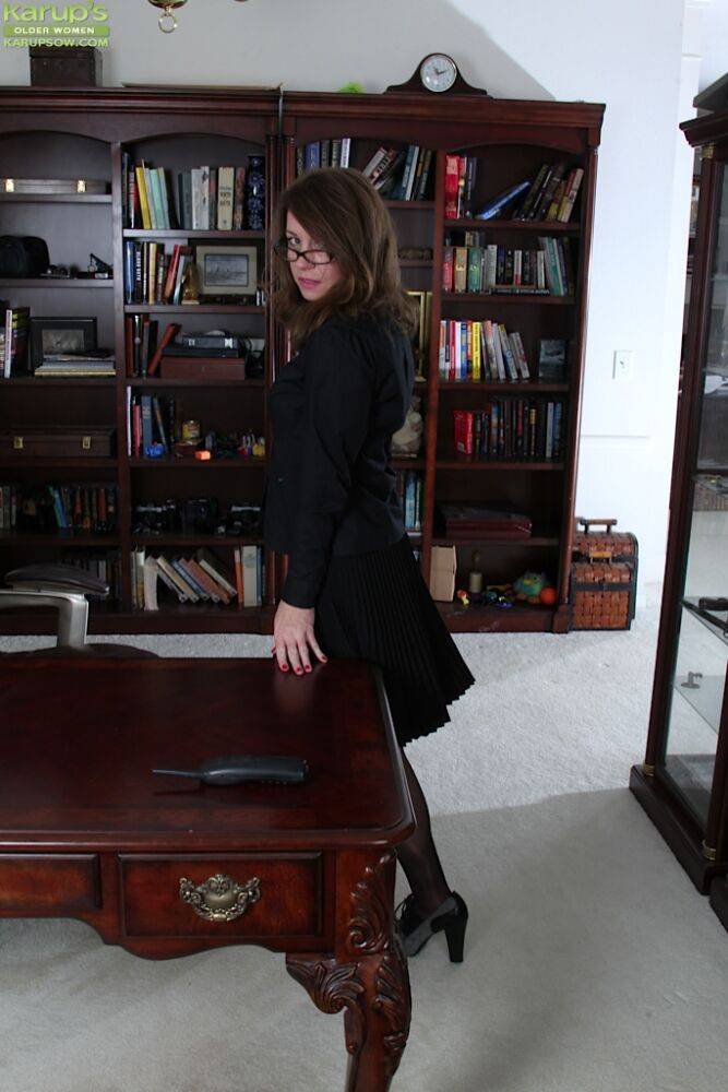 MILF over 40 Joanie Bishop is a sexy secretary in pantyhose and skirt - #16