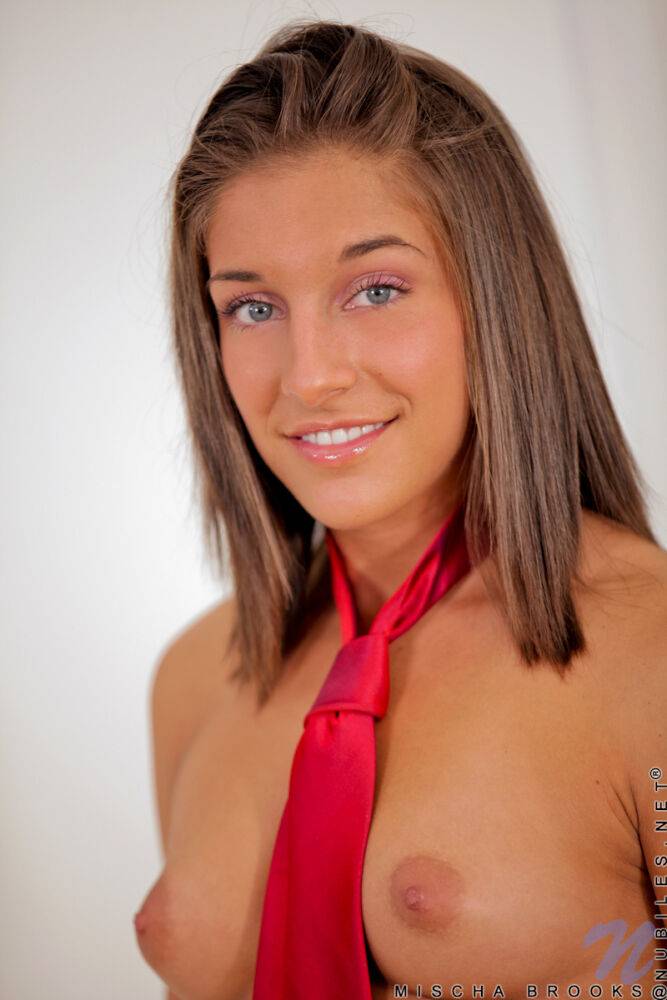 New model poses naked in a necktie before heading off to her college studies - #8