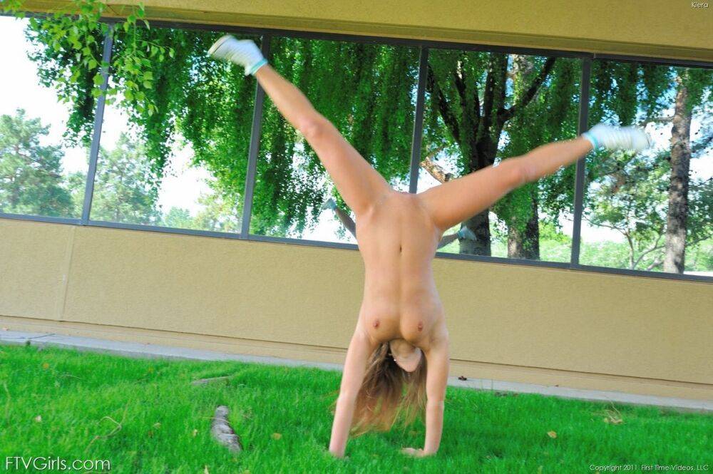 Cute teen Keira does a handstand in the yard after streaking on a public road - #6