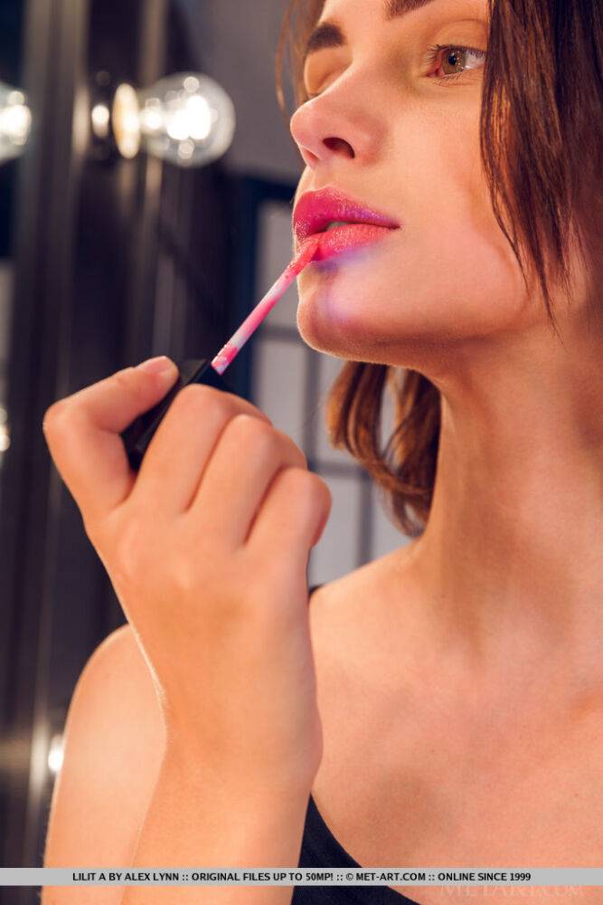 Young beauty Lilit A does her lipstick before modelling in the nude - #11