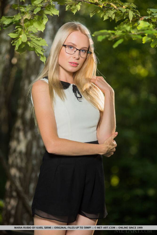 Nerdy teen Maria Rubio disrobes while reading on a blanket in the woods - #8