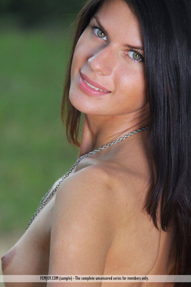 Pretty brunette Katrina gets completely naked on a dirt path in a field - #14