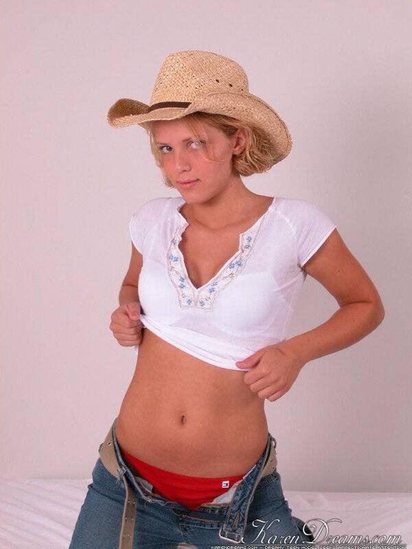 Young blonde Karen covers up her naked breasts with a straw hat in SFW action - #5