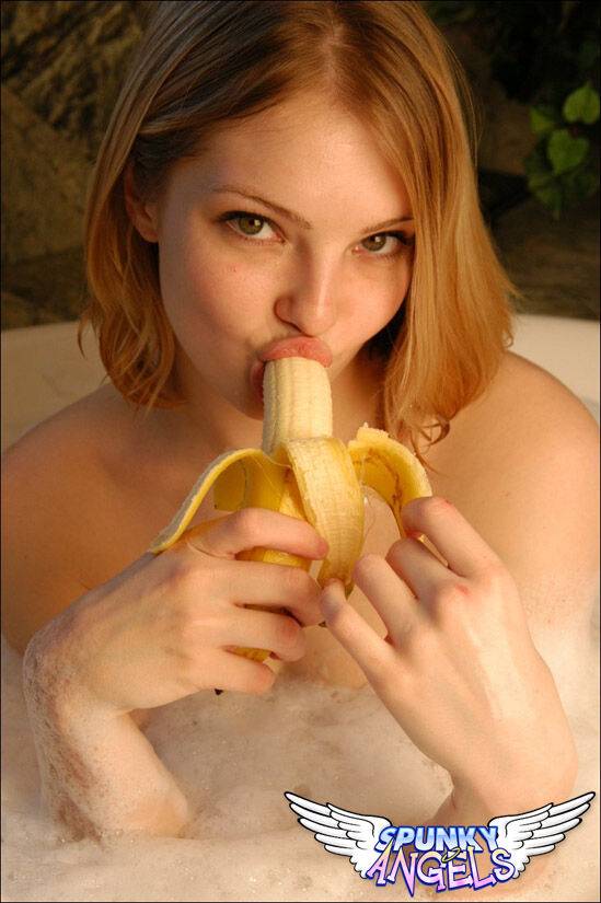 Teen first timer Danielle eats a banana while soaking in a bathtub - #1