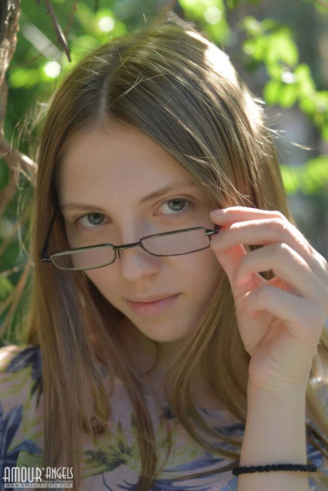 Small titted Catalina in glasses posing naked in a field showing bald muff - #15