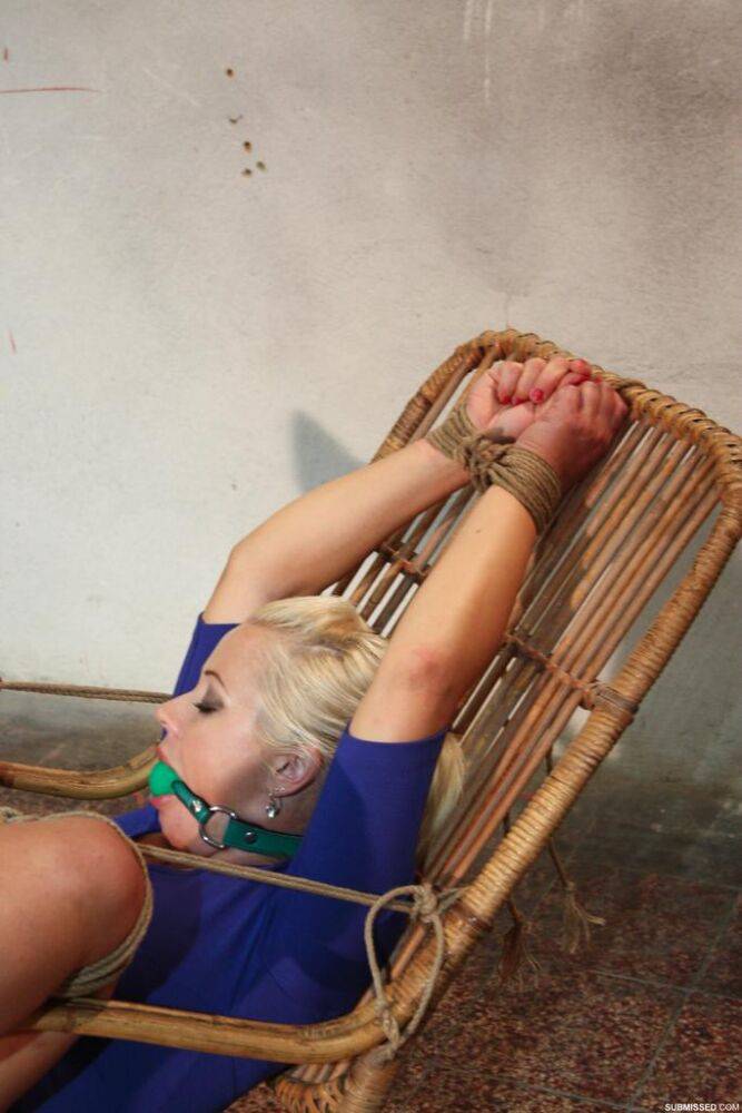 Punky blonde in rope restraints and a ball gag endures a forced masturbation - #2