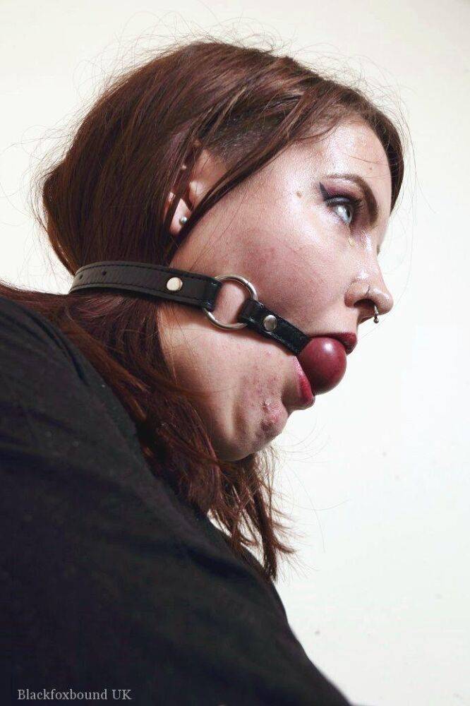 Tattooed redhead Luna La Roux sports a ball gag while restrained with straps - #14