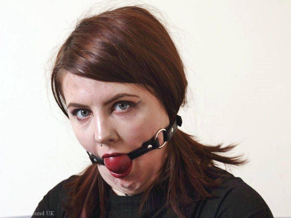 Tattooed redhead Luna La Roux sports a ball gag while restrained with straps - #9