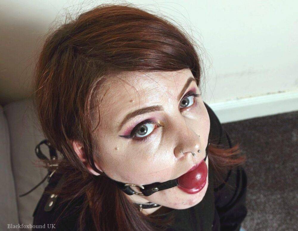 Tattooed redhead Luna La Roux sports a ball gag while restrained with straps - #15