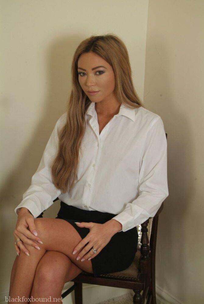 Collared UK female in business attire is kept in cuffs and chains - #10