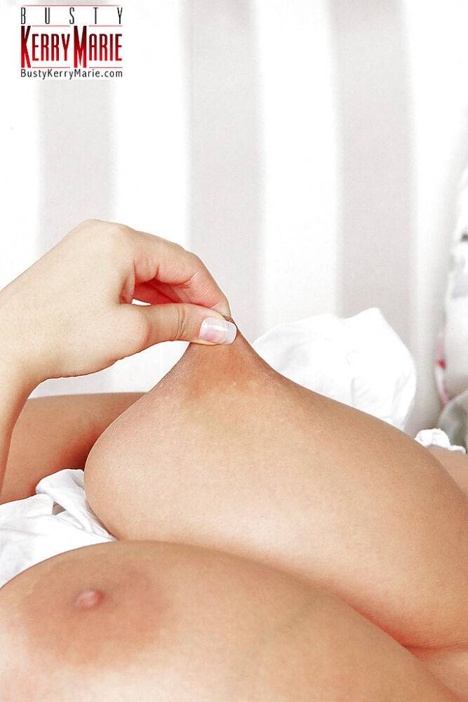 Chubby European pornstar Kerry Marie exposing huge juggs for nipple play - #5