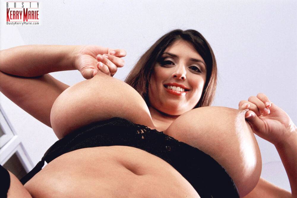 BBW solo model Kerry Marie puts her huge breasts on display in black hosiery - #12