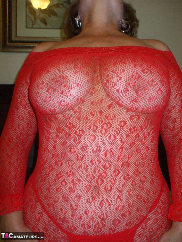 Older amateur Busty Bliss sucks on a finger while modelling sheer lingerie - #6