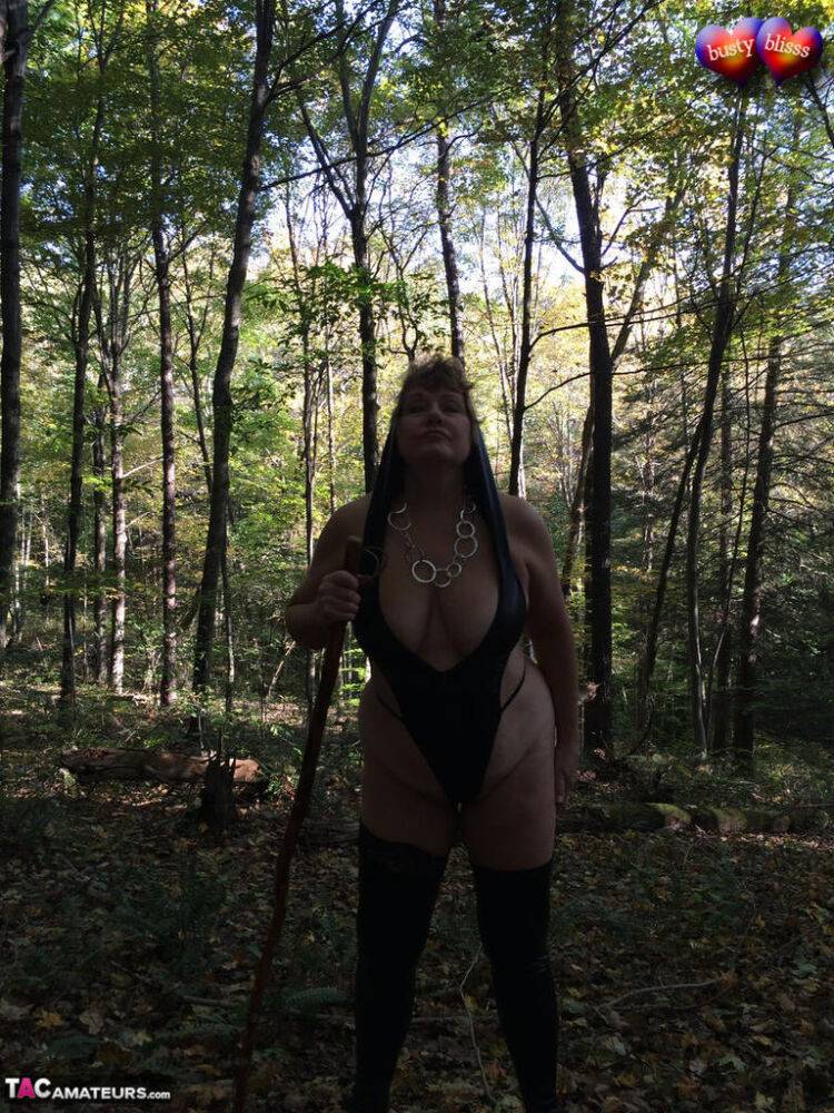 Aged lady Busty Bliss shows her tits in a forest before exposing a man's dick - #11