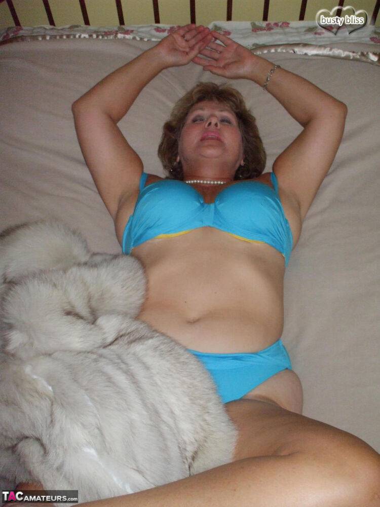 Solo granny Busty Bliss looses her tan lined tits from a fur coat - #1