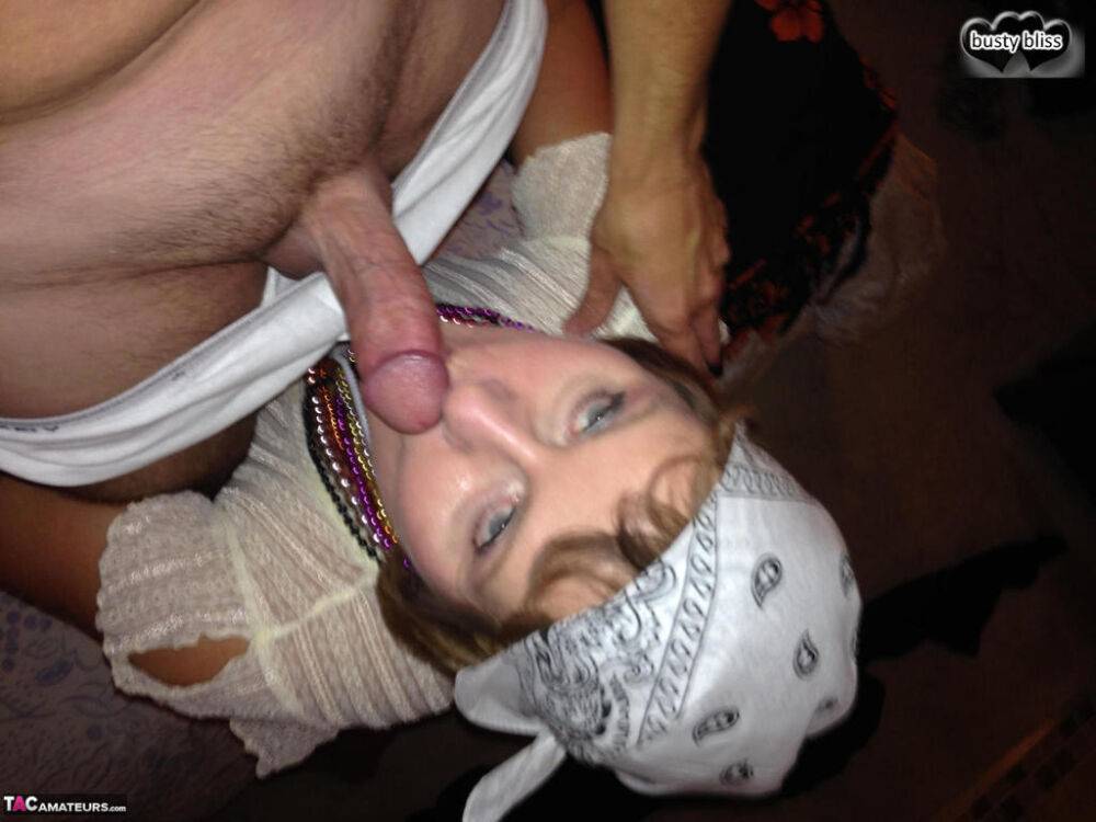 Older woman Busty Bliss gives a blowjob while drinking a beer in a skullcap - #2