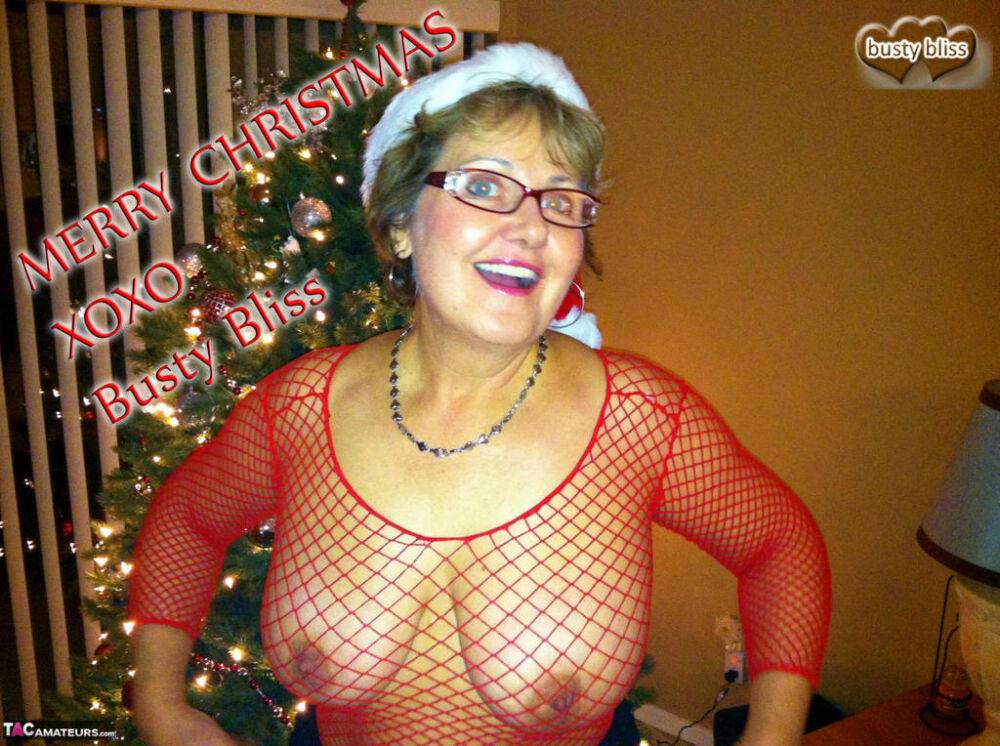 Mature broad Busty Bliss delivers a POV blowjob at Christmas time - #10