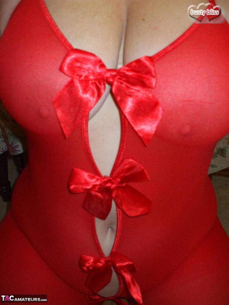 Aged amateur Busty Bliss slurps on a cold beverage while modeling red lingerie - #15