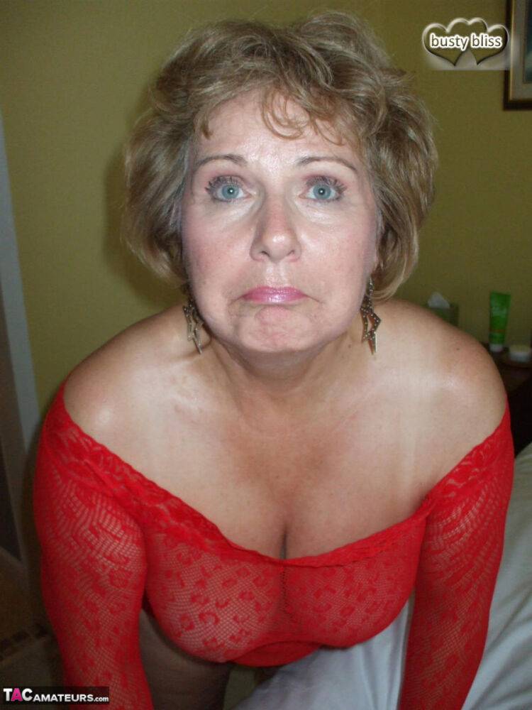 Mature amateur Busty Bliss models sheer lingerie before tugging on a cock - #16