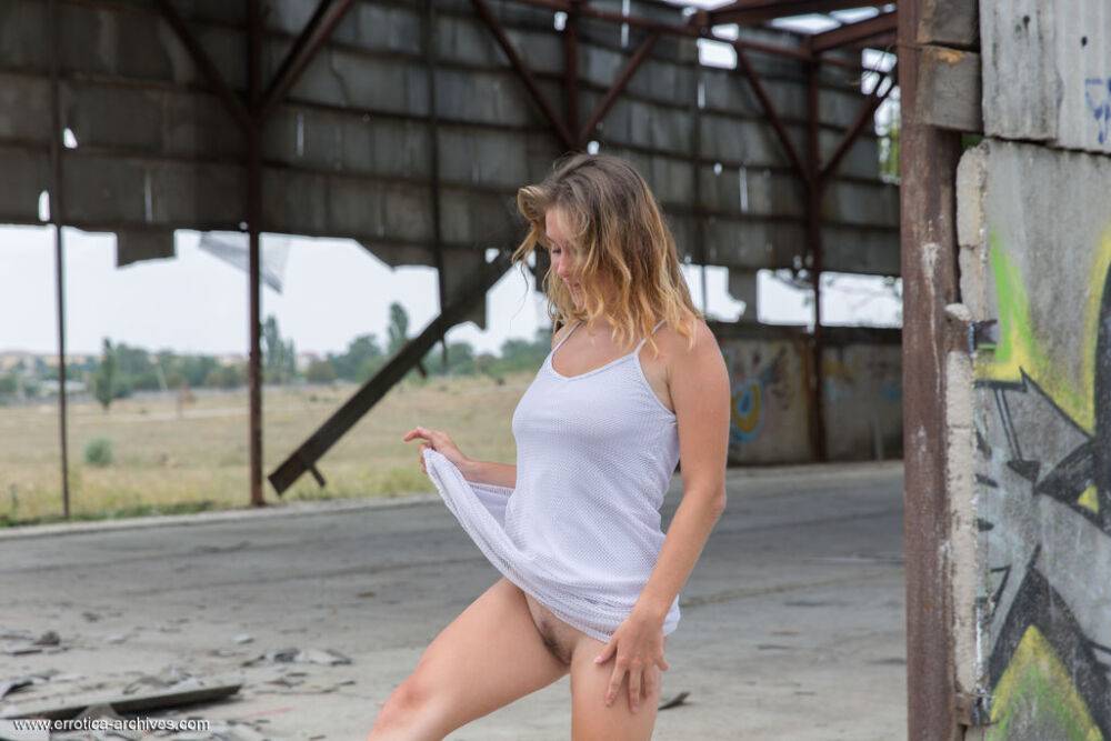 Teen solo girl Anel models totally naked amid ruins of abandoned building - #2