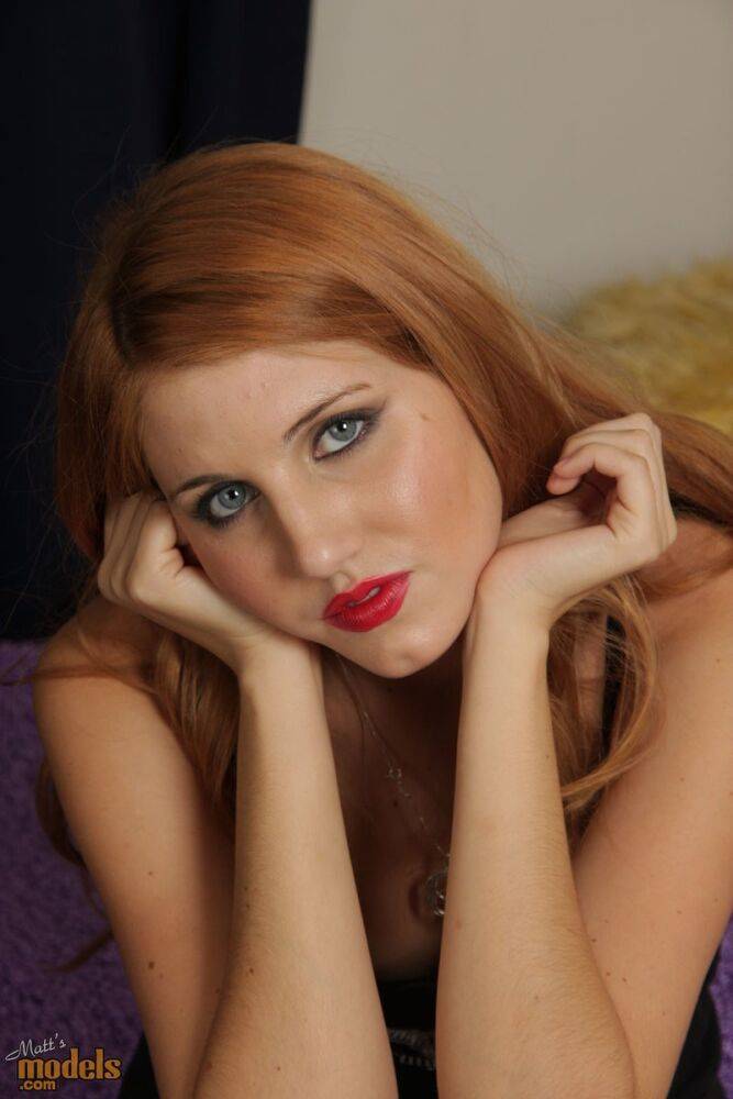 Natural redhead Rita Lovely makes her nude debut while sporting red lips - #16