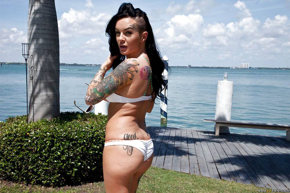 Tattooed whore Lolo Luscious exposing big hooters in swimming pool - #8