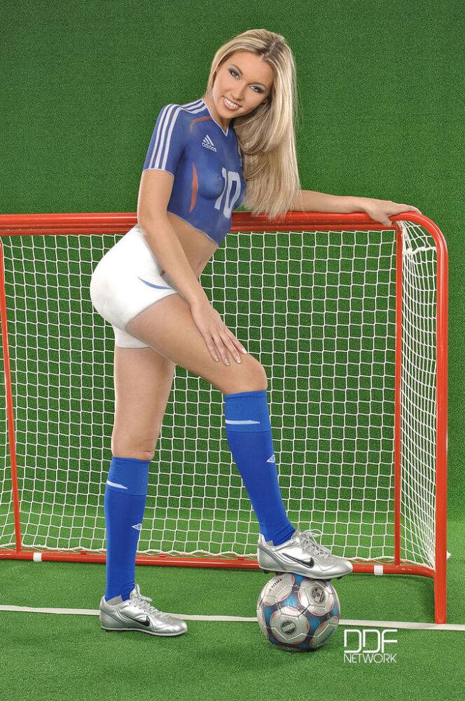 Hot female soccer player Cherry Jul models in skin tight shorts - #16