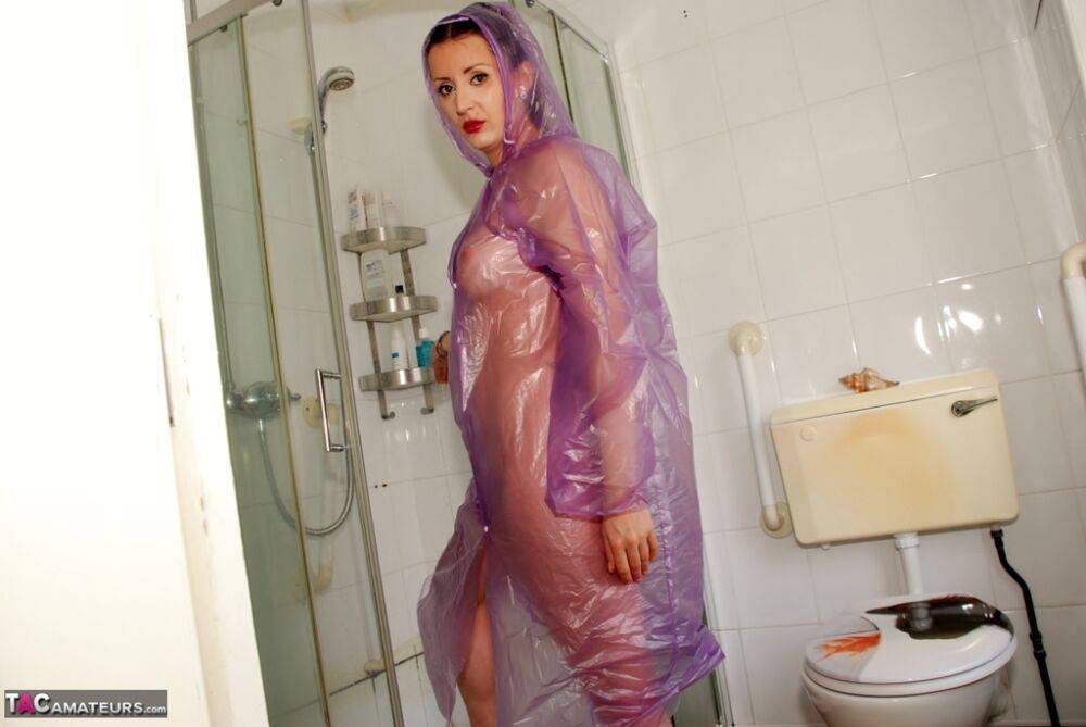 Amateur chick Jessicas Honeyz models by herself in a see-through rain coat - #2