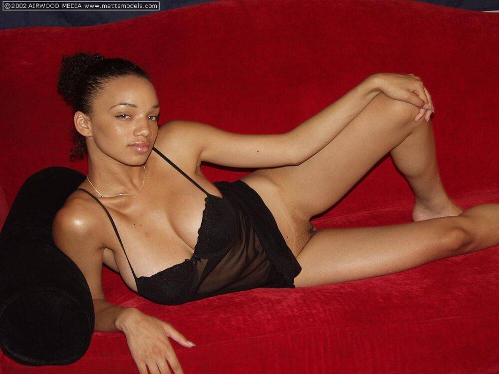 Ebony amateur Gia sheds sheer lingerie to get naked on a red sofa - #12