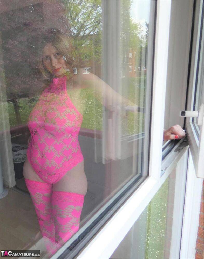 Older amateur Posh Sophia models pink lingerie before changing into a dress - #3