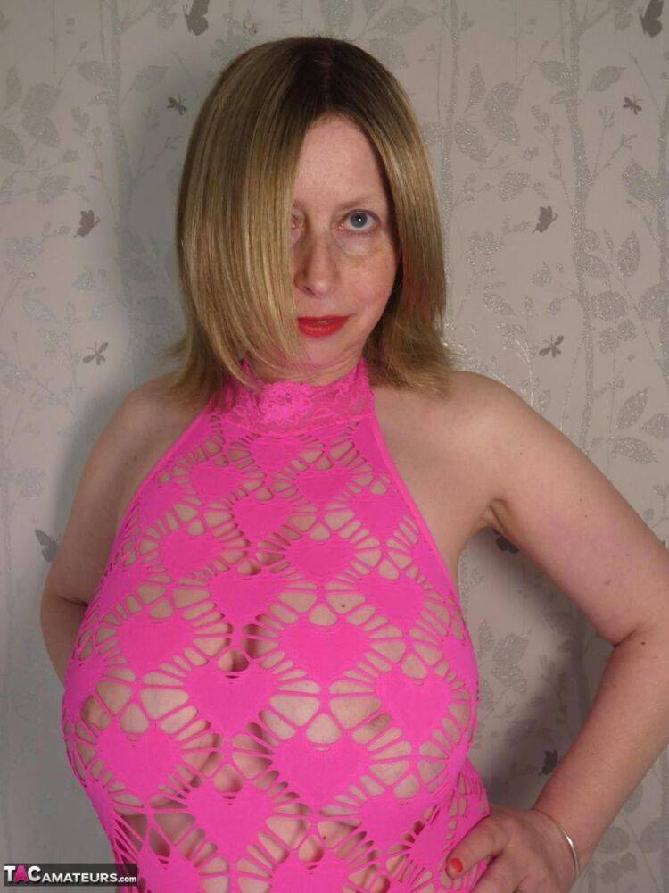 Older amateur Posh Sophia models pink lingerie before changing into a dress - #13