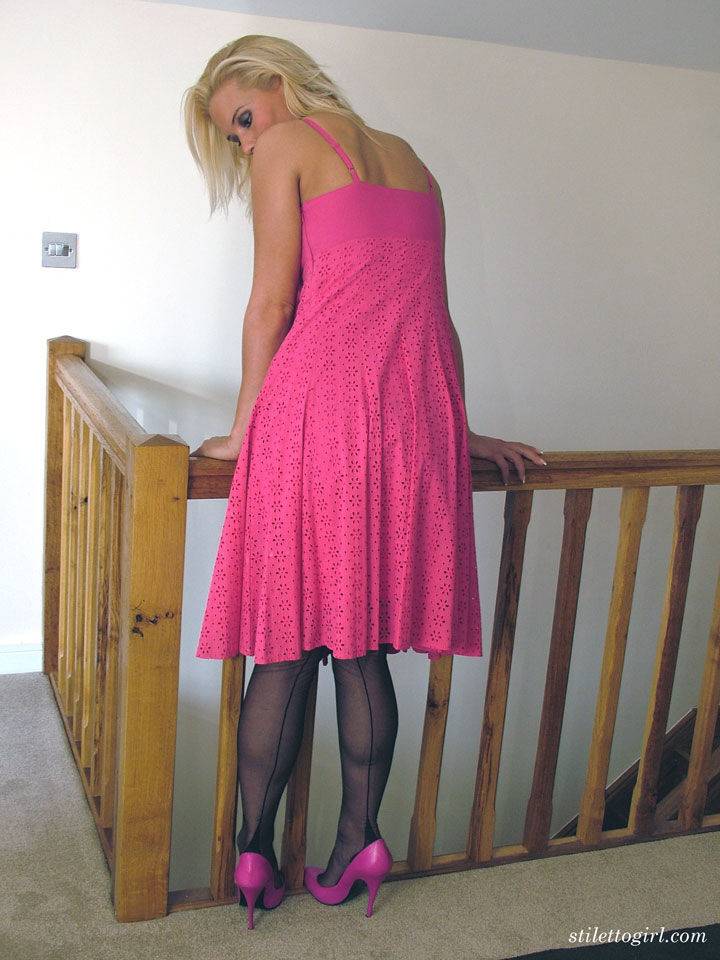 Blue eyed blonde models backseam nylons in pink pumps and a matching dress - #9