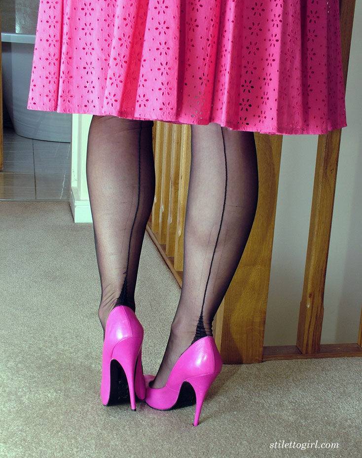 Blue eyed blonde models backseam nylons in pink pumps and a matching dress - #8