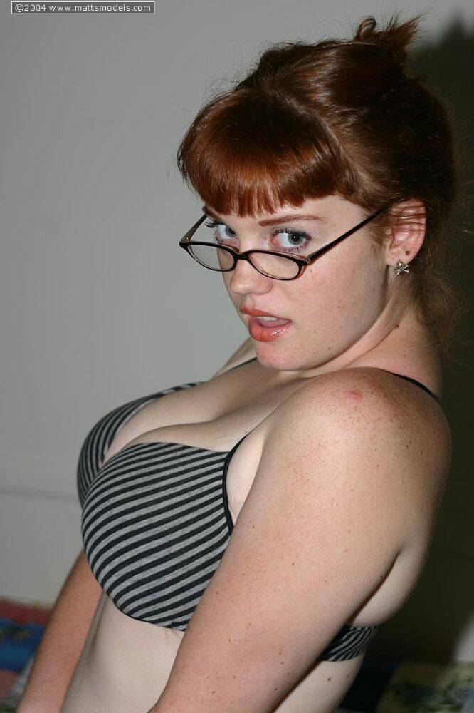 Redhead amateur Sawyer cups her natural breasts before removing her glasses - #13